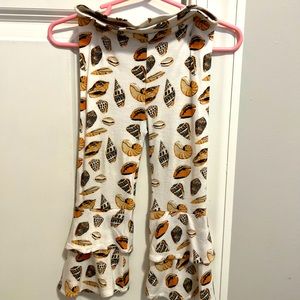 Kate Quinn 18-24 seashell pants fits like 12-18 for us. We wore at 12 months.